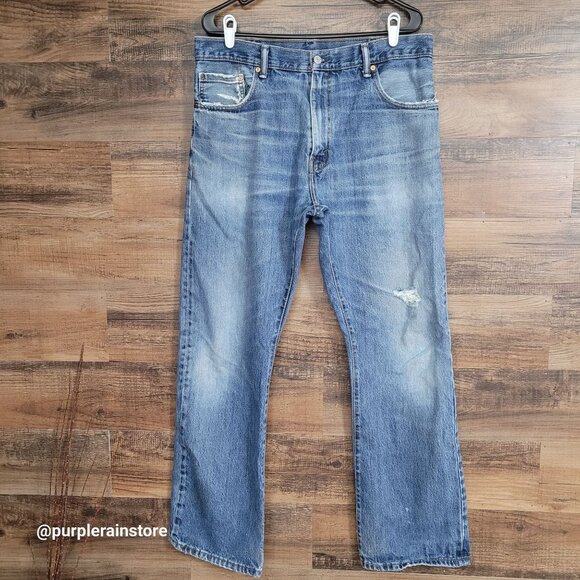 Levi's Jeans 36x34 measures 34x32 Bootcut 517 Medium Light Wash Grunge Western